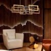 Q21677-GD_ambiente-1.jpg Lampara colgante led integrado cuerpo de aluminio hierro y acrílico en acabado en oro negro y café