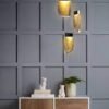 Lampara colgante de led integrado 3 luces cuerpo de cristal ámbar y acabado en oro cepillado