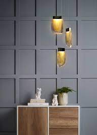 Lampara colgante de led integrado 3 luces cuerpo de cristal ámbar y acabado en oro cepillado