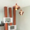 Lampara colgante de led integrado cuerpo de cristal en acabado cobre