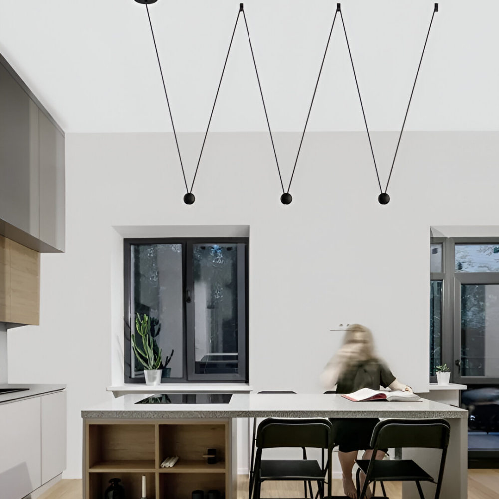 Lámpara led para suspender en techo con tres cuerpos esféricos de aluminio acabado negro ILU9081B3ESF